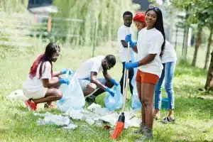 The Ultimate Guide to Stress-Free Rubbish Removal 2 group happy african volunteers with garbage bags cleaning area park africa volunteering charity people ecology concept