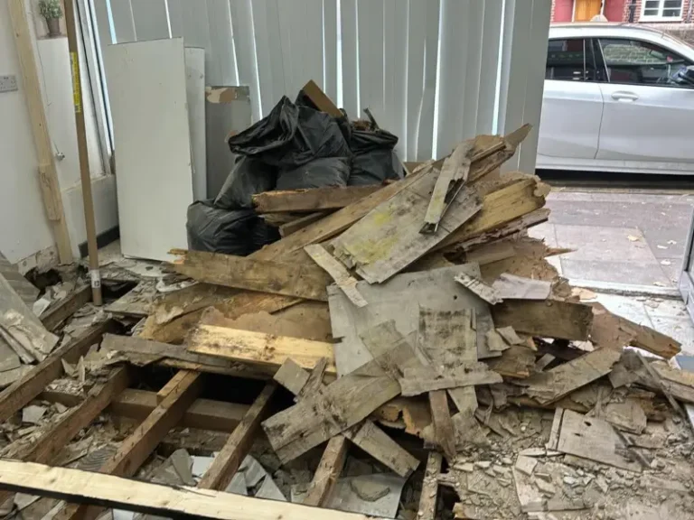 Broken wood and builders waste in a garage, ready for collection